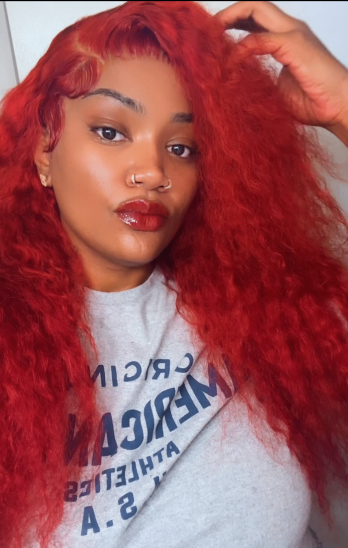 Michelle bold red hair look